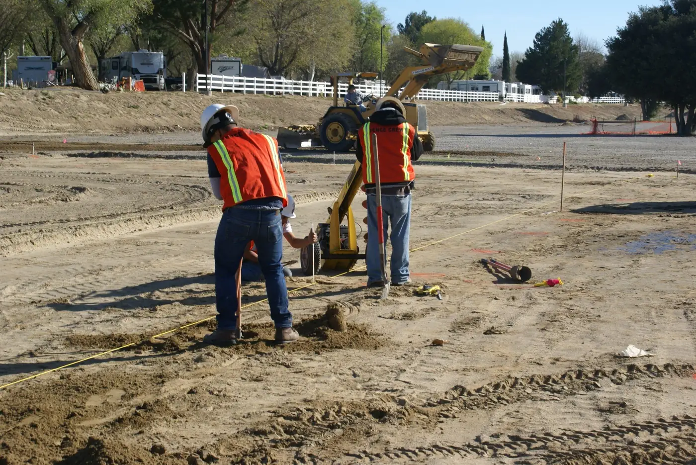 Fence-X-Ellent crew setting a commercial fence line