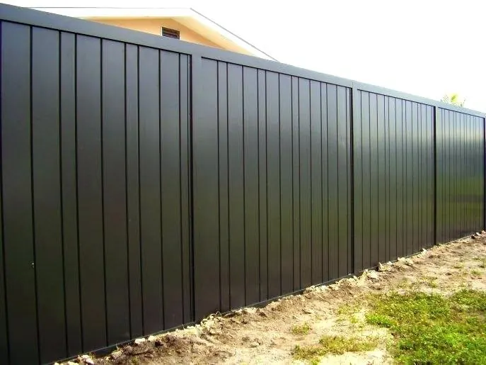 Dark metal privacy fence built by Fence-X-Ellent